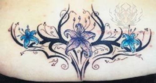Tribal and Flowers Tattoo On Lower Back